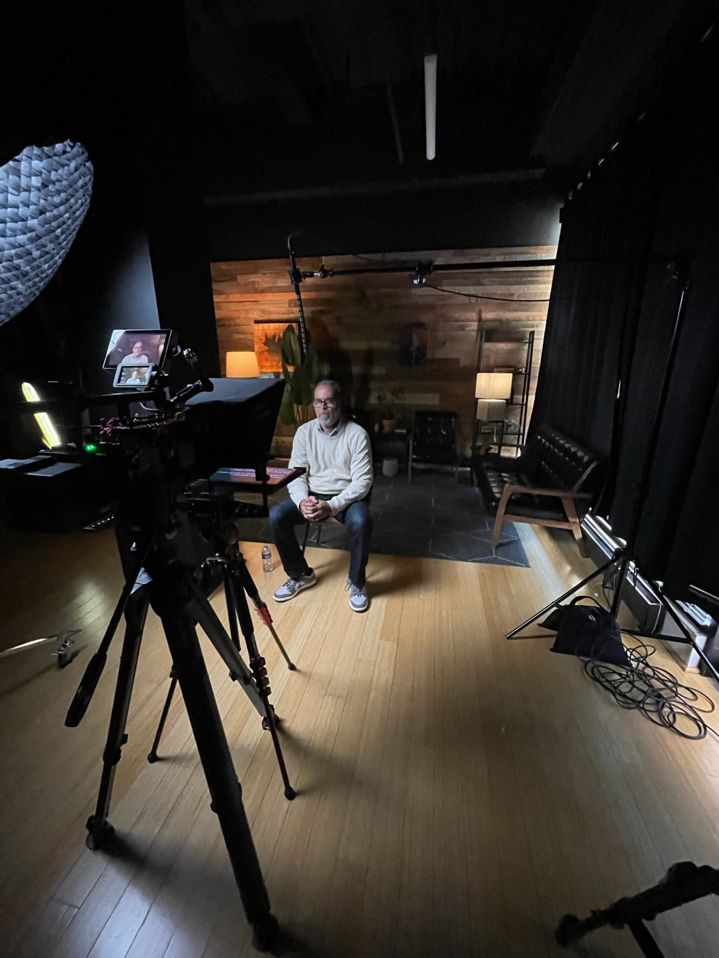 Studio interview setup with lighting and camera