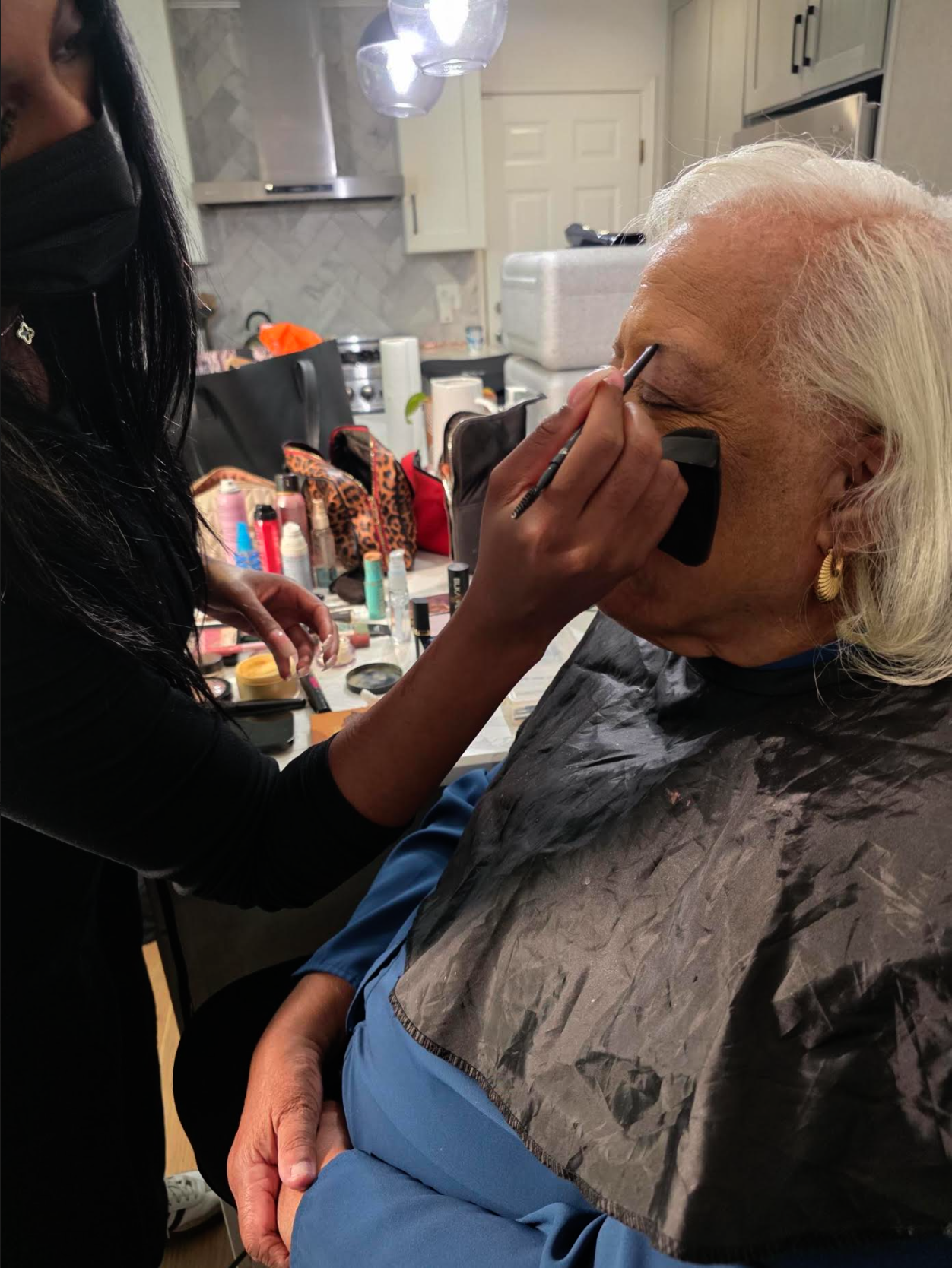 Interview subject in makeup before filming